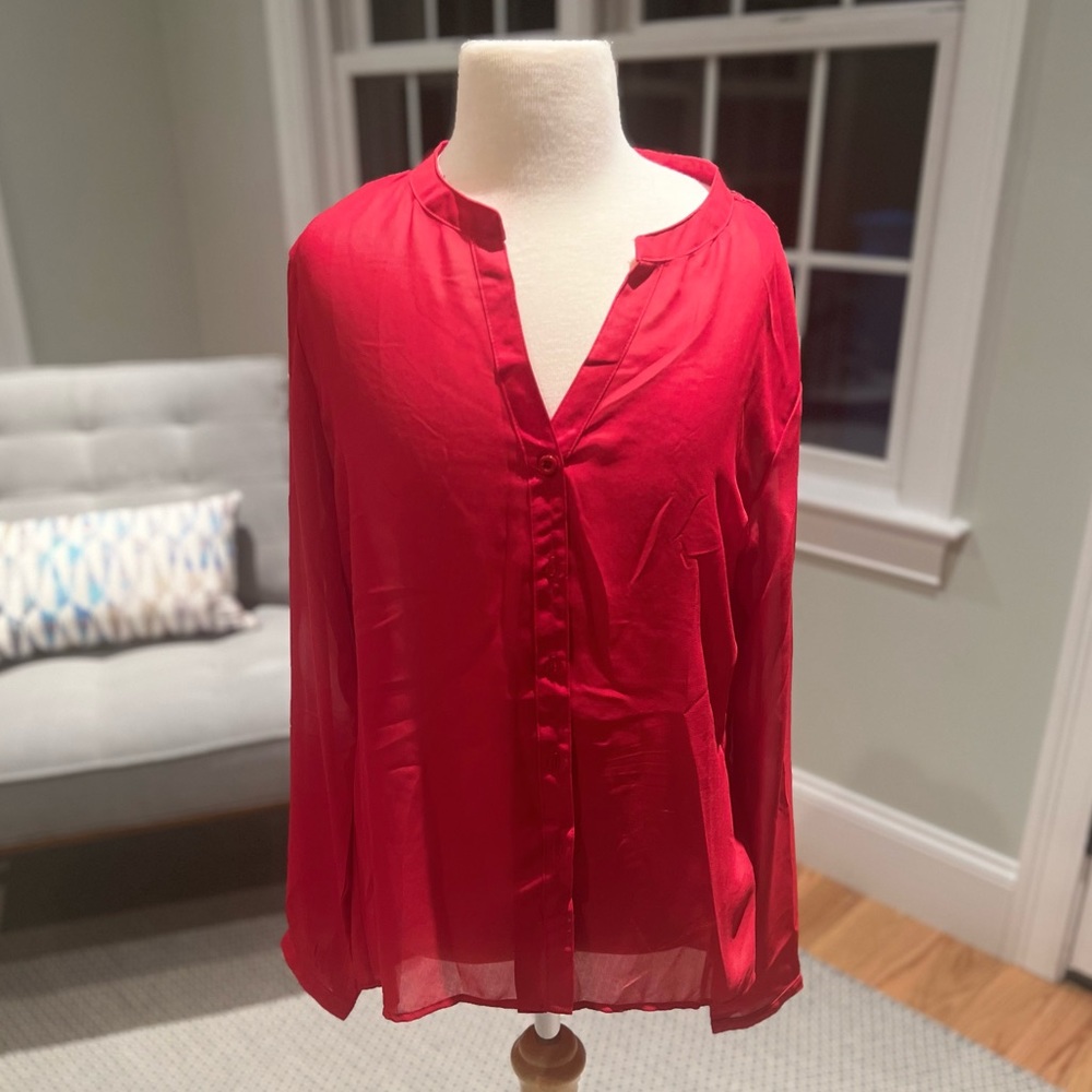 Tart red blouse with back lace detail.